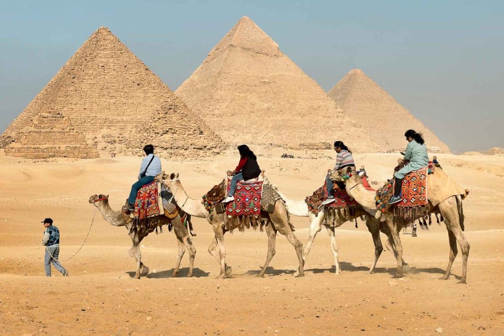 tourist admiring the egyptian pyramids